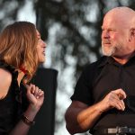 Charlotte Boyce Munson and Mike Ryan speaking to eachother